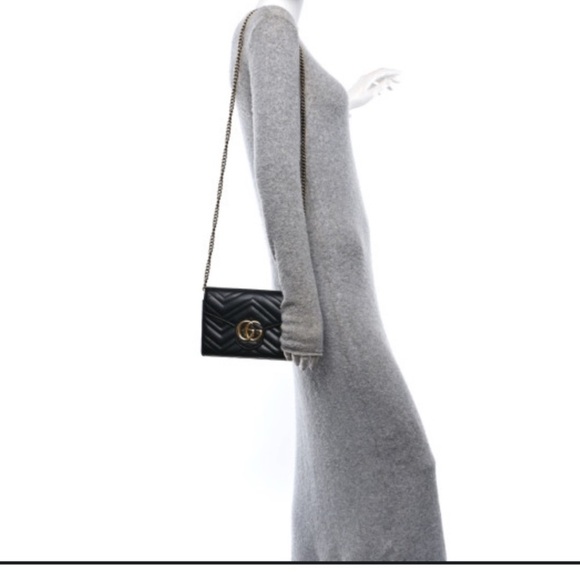 Gucci Black Leather Clutch with Gold Accents - Picture 8 of 9